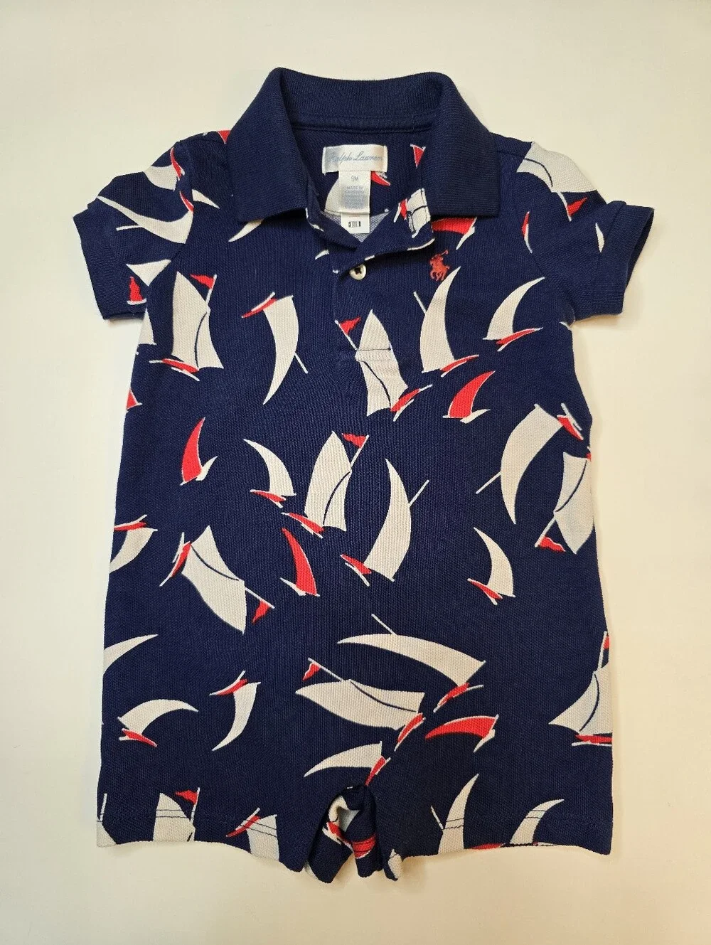 Ralph Lauren Navy Polo Romper with Red & White Sailboat Print